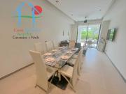 Depa de playa con terraza y jardín privado