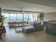 Depa de playa con terraza y vista parcial al mar