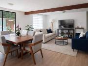 Departamento con amplio jardín privado