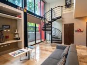 Venta departamento loft de doble altura frente puerto cancun