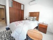 Departamento de 2 Recamaras con Rooftop y Alberca A 15...