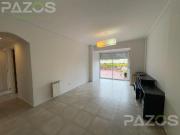 Departamento de 4 ambientes con terraza y patio
