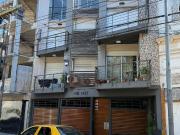 Departamento de dos ambientes con cochera y balcon