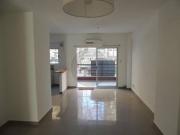 Departamento de Tres Ambientes con patio y cochera en...