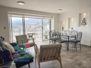Departamento en piso alto con terraza y vista a la ciudad