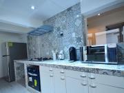 Departamento en renta en PB amueblado con jardín