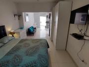 Departamento loft con terraza a media cuadra del malecón