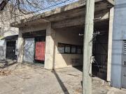 Depósito con oficinas dentro del casco urbano