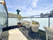 Design trifft Lage: Dachgeschosswohnung mit Wintergarten...