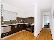 DESIGNER APARTMENT WITH PARKING & STORAGE SHED