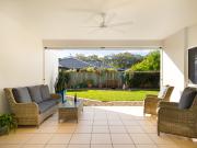 Designer Coastal Escape in Coveted Twin Waters Enclave