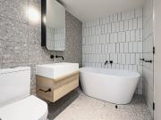 Designer Living with Rooftop City Views