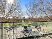 Directly opposite Albert Park