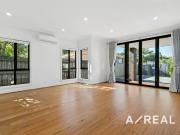 Do Not Miss Out! Rare Modern Townhouse in McKinnon SC Zone!