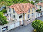 Doppelhaushälfte mit 5,5 Zimmern Garage, 2 Terrassen und...