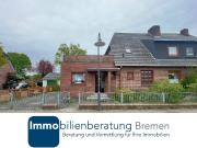 Doppelhaushälfte mit Anbau und Garage auf großem Grundstück
