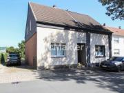 Doppelhaushälfte mit großem Garten und viel Potenzial in...