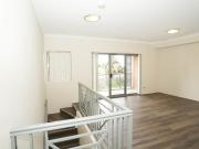 DUAL LEVEL APARTMENT & HANDY LOCATION