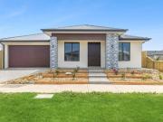 Dual Master Suites. Premium Upgrades. The Home...