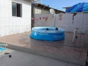 Duas casas no mesmo terreno em Tramandaí espaço,... Duas casas no mesmo terreno em Tramandaí espaço,...