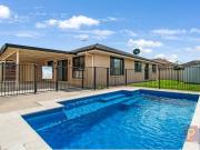 DUCTED AIR | OPEN PLAN LIVING | IN GROUND POOL!