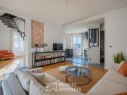 Duplex au centre ville en dernier étage avec vue montagnes