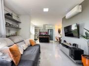 Duplex no Lago Norte: Design Contemporâneo, Terraço com...