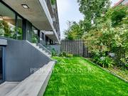 Dúplex seminuevo con jardín privado en Vitacura – Sector...