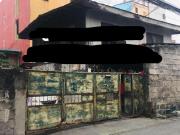 East Rembo vacant lot with dilapidated house near BGC