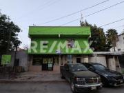 EDIFICIO CON DEPARTAMENTOS Y LOCALES