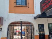 EDIFICIO CON DEPARTAMENTOS Y LOCALES COMERCIALES: COL....