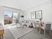 Effortless Beachside Living in a Secure, Sun Drenched...