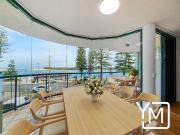 Effortless Coastal Living Beachfront Apartment with Dual...