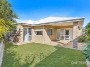 Effortless Coastal Living in a Thoughtfully Designed...