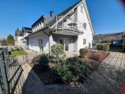 Eigentumswohnung mit Garten und Garagen