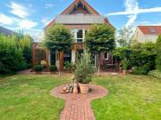 Eigentumswohnung mit Wintergarten und Garten