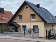 Ein Zweifamilienhaus mit Ferienwohnung