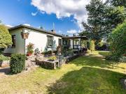 Einfamilienhaus im Bungalowstil mit Garten nähe...