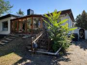 Einfamilienhaus im Bungalowstil mit großem Garten in...