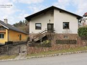 Einfamilienhaus mit eingezäuntem Garten und Garage in...