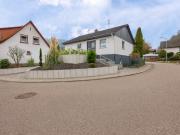 Einfamilienhaus mit erweitertem Raumangebot und wohnlich...