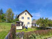 Einfamilienhaus mit Garten und Garage in Schönau