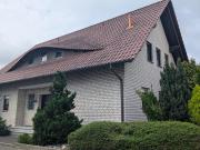 Einfamilienhaus mit Mietwohnung und Fremdenzimmer in...