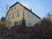 Einfamilienhaus mit Scheune und Halle in 97762...