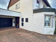 Einfamilienhaus mit Wintergarten, Garage + parkähnlichem...