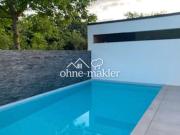 Einmaliges Einfamilienhaus mit Pool in Feldrandlage