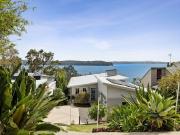 Elegant coastal home with lake views