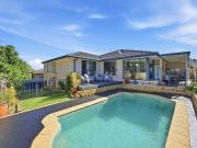 Elegant Family Living With Poolside Serenity