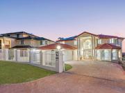 Elegant Hilltop Entertainer with Stunning Sunset Views