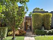 Elegant, Timeless Townhouse Living in a Blue Ribbon Location